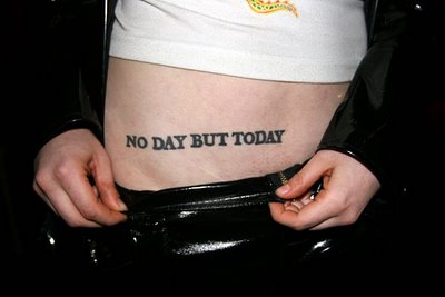 Her RENT tattoo